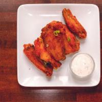 Cajun Dry Rub Wings · Cayenne, black pepper, and garlic served with ranch. 7 per order.