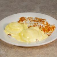 Traditional Eggs Benedict · Canadian bacon, poached eggs on an English muffin topped with our homemade hollandaise sauce.