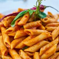 Penne Pasta · Our Penne Pasta is served with homemade marinara sauce, a fresh made garlic bread and a hous...