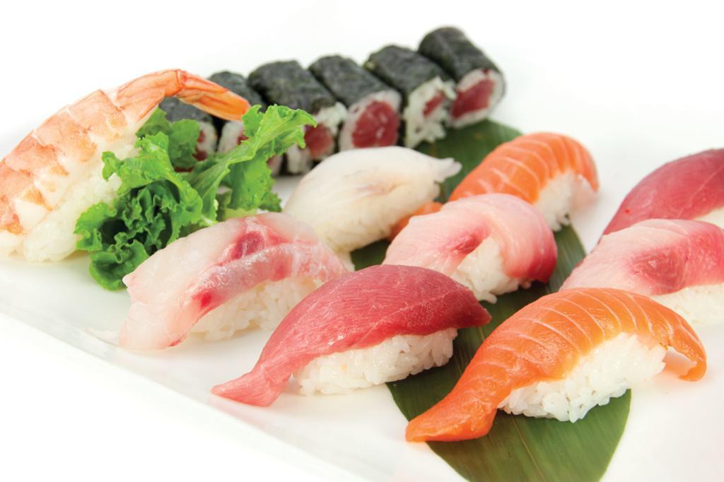 10 Pieces Sushi Deluxe · Assorted sushi and tuna roll.
