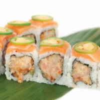 Mexican Roll · Spicy yellowtail and cucumber on the inside and salmon and jalapeno on the outside.
