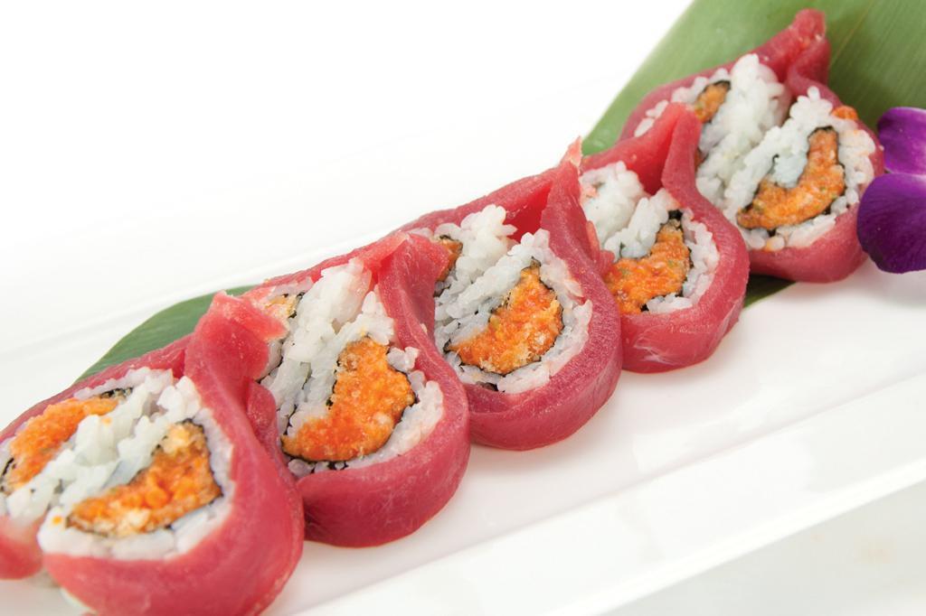 Valentine Roll · Spicy tuna and avocado on the inside and fresh tuna on the outside.