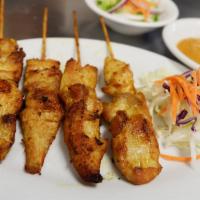 4 Pieces Chicken Satay · Grilled marinated chicken skewers. Served with homemade peanut sauce and cucumber salad.