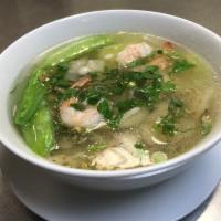 Wonton Soup · Wontons, chicken, pork, shrimp, and vegetables in chicken broth. Topped with cilantro and gr...