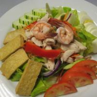 Thai Green Salad · Romaine lettuce, tomatoes, cucumbers, bell peppers, onions, carrots, fried tofu, shrimp, chi...