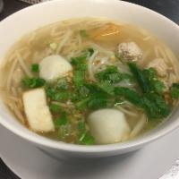 Tom Yum Noodle Soup · Rice noodles with fish balls, ground chicken, and bean sprouts served in a sweet and sour br...