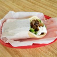 Gyros · Gyros meat, tomatoes, onions, cucumber and tzatziki sauce all wrapped up in a pita.