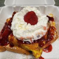 Strawberry French Toast · 3 slices of thick Texas French toast, topped with homemade strawberry compote and whipped cr...