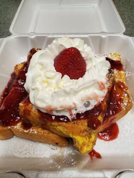 Strawberry French Toast · 3 slices of thick Texas French toast, topped with homemade strawberry compote and whipped cream.
