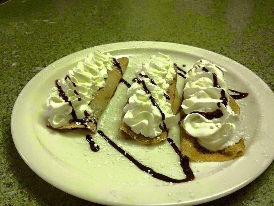 French Crepes · Homemade French crepe filled with choice of blueberry compote , strawberry compote , Nutella, Peanut butter and whipped cream on top.