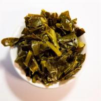 Collard Greens · We probably sell a ton of these yearly. Fresh, and like all our sides: no meat added.