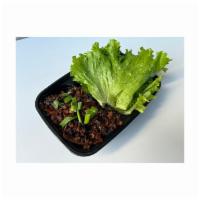 Chicken Lettuce Wraps · Seasoned Chicken marinated with Water Chestnuts and Shiitake Mushrooms, served over crispy r...