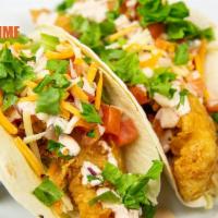 Fish Tacos  · 2 pieces. Fresh fried grouper, shredded cabbage, pico de gallo, mixed cheese and spicy cream...