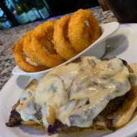 Philly Steak Sandwich Lunch · Thin- sliced sirloin steak sauteed with onions, peppers and mushrooms topped with melted moz...