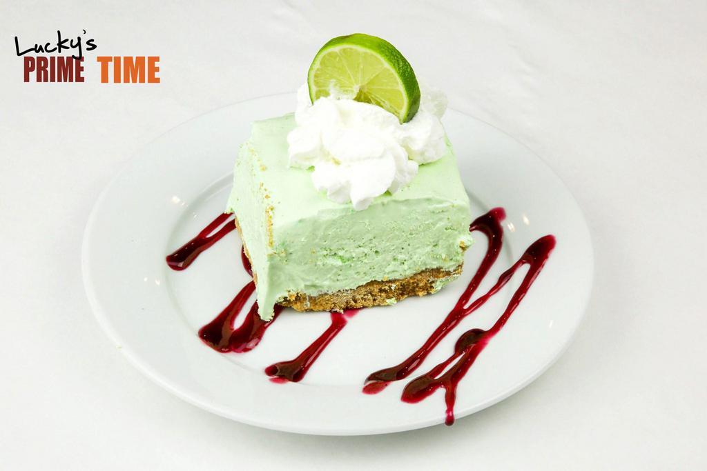 Key Lime Pie  · Graham cracker crust topped with fresh raspberry sauce.