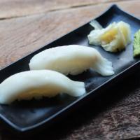 W175. White Fish Sushi · 2 pieces.