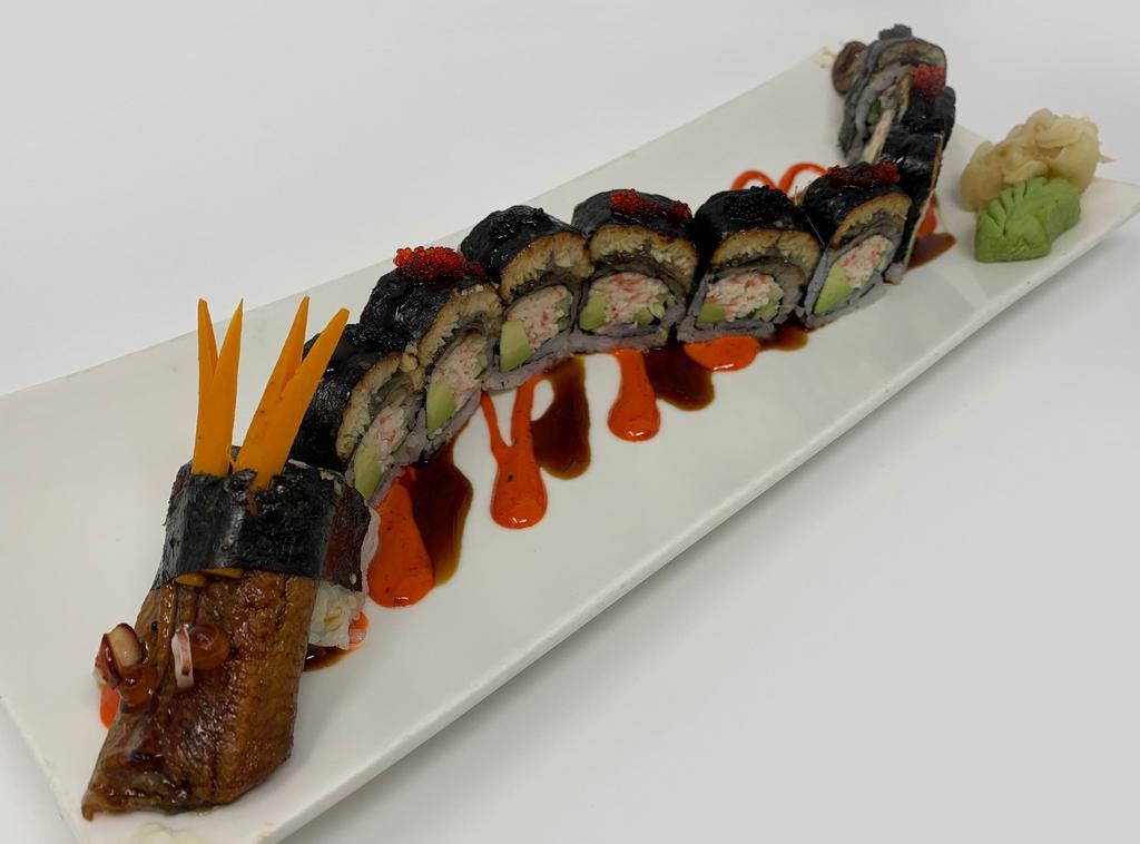 W245. Flying Dragon Roll · Eel lover choice, kani, avocado and cucumber decorated with eel and tobiko.