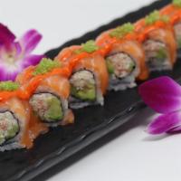 Sunset Roll · Crab meat, avocado and cucumber inside, fresh salmon with variety of tobiko and touch of spi...