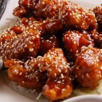 Sesame Chicken · Chicken in a sweet sauce served with sesame seeds.