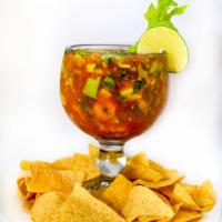 Cocktail Shrimp · Made with our own family recipe cocktail sauce mixed with raw diced onions, cilantro, avocad...