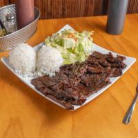 Beef Teriyaki · Hand-trimmed lean marinated beef, grilled and served with our house-made teriyaki sauce. Ser...