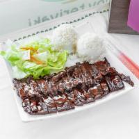 Spicy Beef Teriyaki · Served with steamed veggies and jasmine rice.
