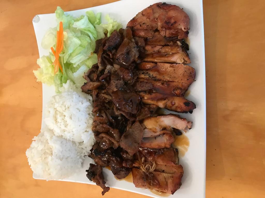 Chicken and Pork Teriyaki Combo · The best of both worlds. Our 100% fresh chicken plus our trimmed lean pork topped off with our delicious house teriyaki sauce. Served with your choice of either jasmine rice or brown rice as well as steamed veggies.