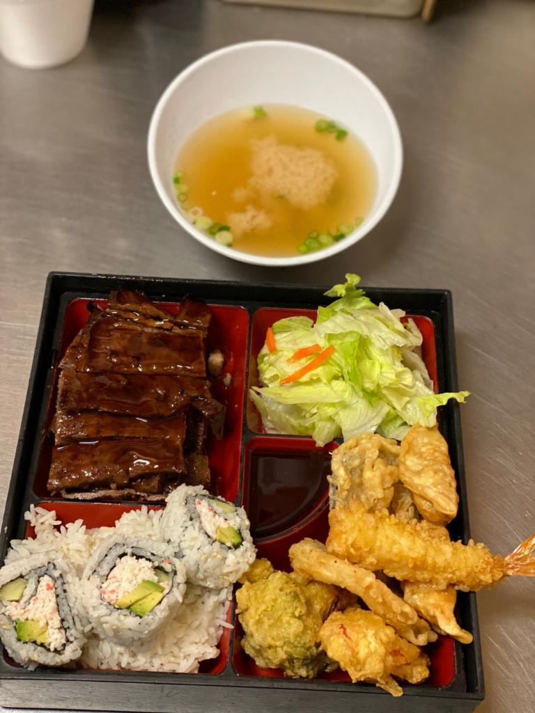 Beef Short Rib Bento Box · Beef short rib served with rice, 3 California roll, 5 tempura, salad and miso soup.