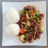Mongolian Beef · Mongolian beef served with steamed veggies and jasmine rice.
