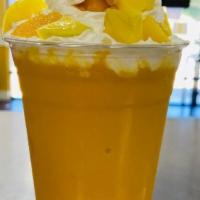 Mango Twist Smoothie · Fresh mango, mango pulp, low fat yogurt, topped with mango chunks.