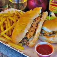 Fried Chicken Po’ Boy · Pickle chips, remoulade sauce on a toasted bun