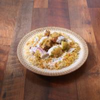 Chicken Dum Biriyani · Served with raita and salan. 