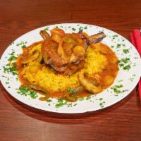 Pork Chops · Pork shops sauteed with onions, peppers and mushrooms with ranchero sauce.