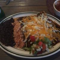 Picadillo Enchilada (Ground Beef) · Rice, beans, cheese, lettuce, pico de gallo and your choice of sauce.
