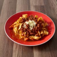 Pasta and Meat Sauce · Pappardelle bolognese. Broad noodles tossed in a classic meat sauce from the Bologna region,...