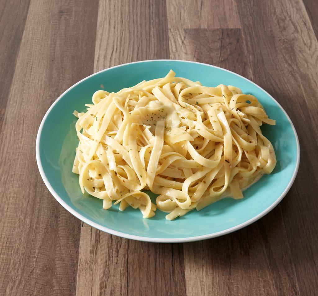 Fettuccini Alfredo · Classic pasta dish made with a creamy sauce of Parmesan cheese, butter and spices. Vegetarian. 