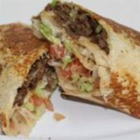 Asada Burrito · Topped with beans, cheese, sour cream, lettuce, tomato, and avocado