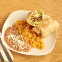 Burrito Dinner · Topped with beans, cheese, sour cream, lettuce, tomato and avocado. Accompanied with beans a...