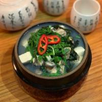 굴국밥 / Oyster Rice Soup · Served with 1 rice & 4 side dishes.