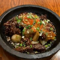갈비찜 / Boiled Beef Ribs · Served with 2 rice & 4 side dishes.