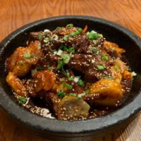 불갈비찜 / Spicy Boiled Beef Ribs · Served with 2 rice & 4 side dishes.