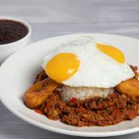 Picadillo Jinetero · Cuban ground beef hash with rice and beans, two eggs, and ripe plantains.