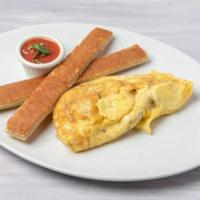Tortilla de Huevos y Maduros · Egg and rice plantain omelette and pressed Cuban toast.
