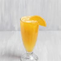Jugo de Naranja Natural · Fresh squeezed orange juice.