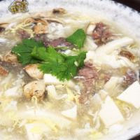 S2. West Lake Beef Soup 西湖牛肉羹 · Egg white drop soup with beef. 