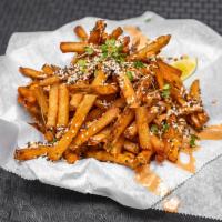 Sesame  Fries · Toasted sesame seeds, spicy ponzu mayo sauce, and scallions.