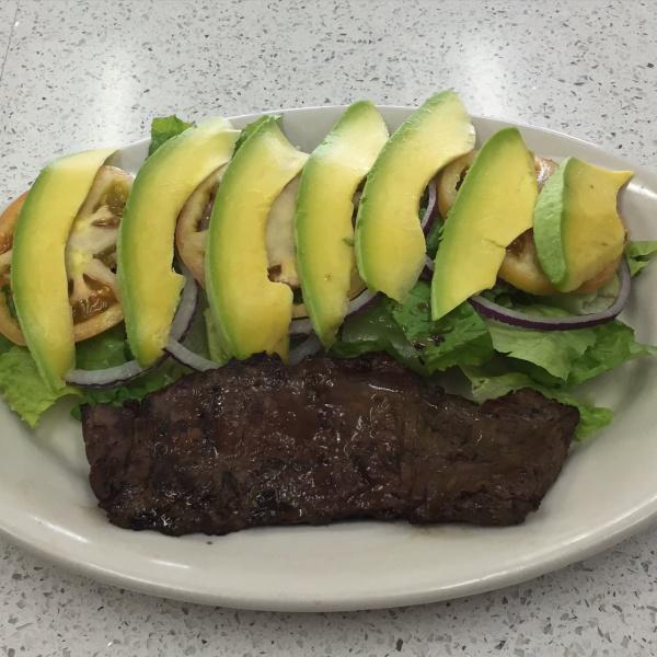 Churrasco Avocado Salad · Grilled skirt steak, fresh romaine lettuce, onions, tomatoes and avocados. Served with olive oil and balsamic vinegar.