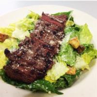 Churrasco Caesar Salad · Grilled skirt steak, fresh romaine lettuce, croutons, parmesan cheese, and ceasar dressing. 