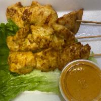 4 Satay Chicken · Grilled curry marinated chicken on skewer and peanut sauce. (GF)