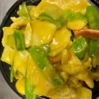 Chicken Coconut Curry · Snow peas, bell peppers and onions. Served with your choice of rice. 